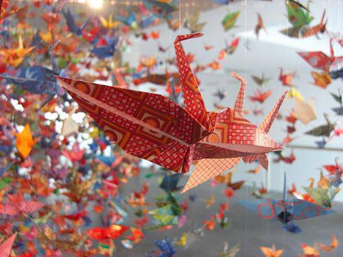 What is origami and where did it originate?