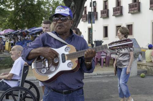 The Role of Street Musicians in Urban Cultural Dynamics